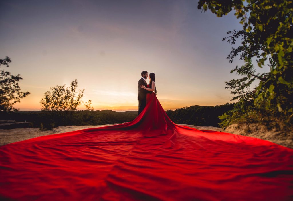 Engagement Photography in a Long Train Red Dress at Dundas Peak